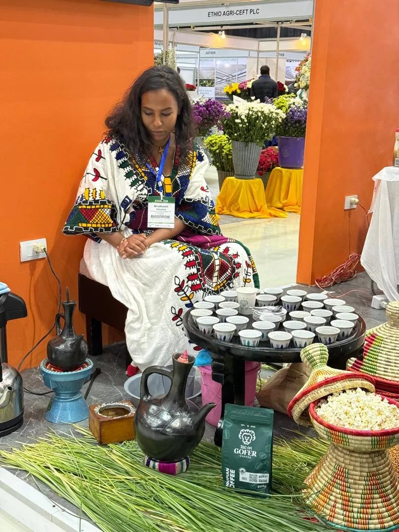 A traditional Ethiopian coffee ceremony at the Gofer Coffee stand, with jebena pots and Gofer Coffee beans